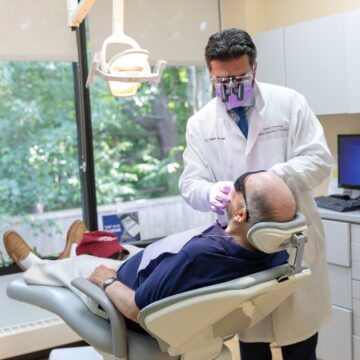 Dentist doing treatment of Patient